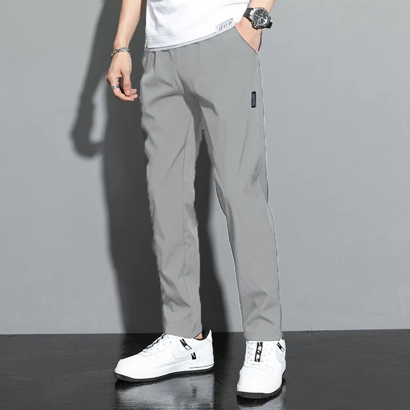 Summer hot selling men's ice silk quick drying casual pants slim fit ice silk sports pants straight tube quick drying